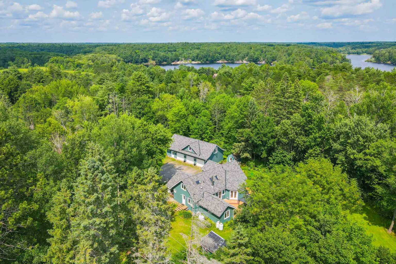 real estate photography waterfront home drone shot